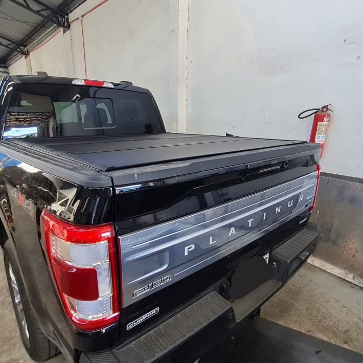 Tapa plegable bajo riel F150
